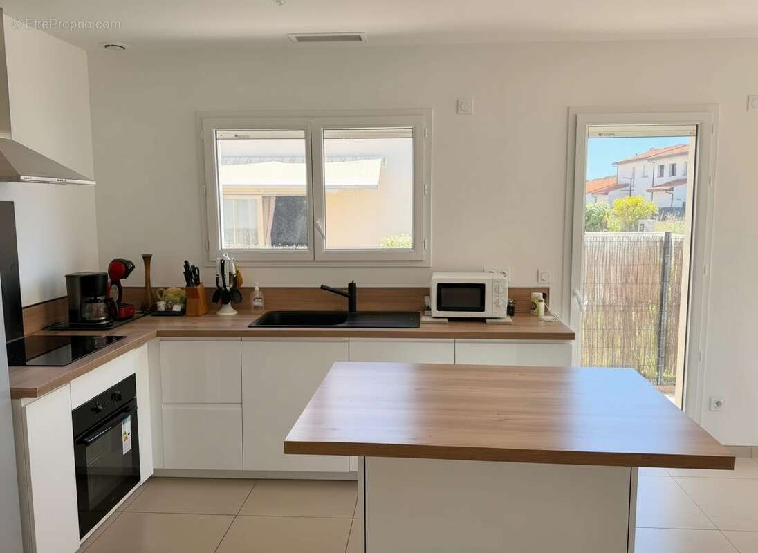 Maison 87 m² à Le Boulou  - photo 2
