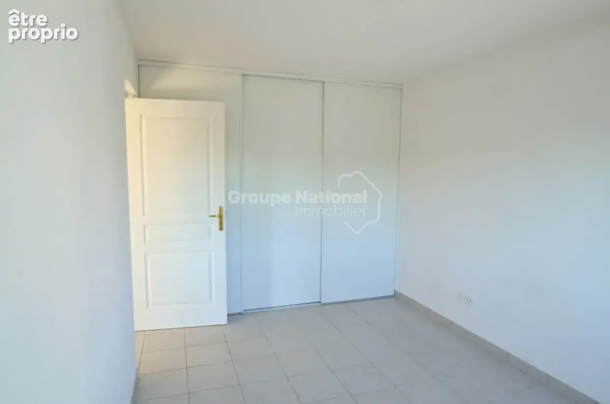 T3 climatisé de 55 m²  avec balcon couvert + garage privatif au sous-sol  dans une copropriété recherchée - photo 5