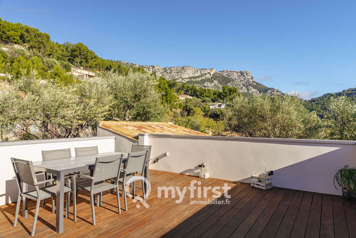 Un appartement entre jardin secret et rooftop suspendu - photo 4