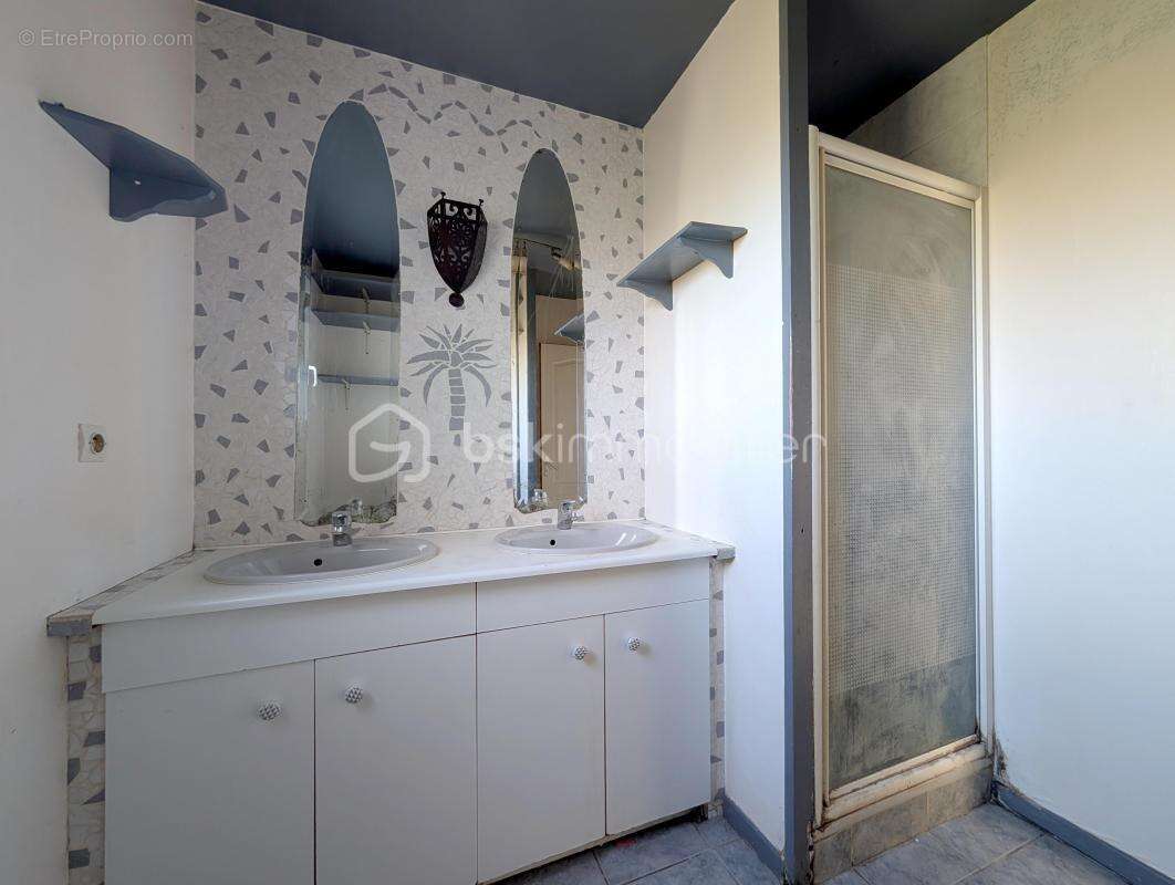 Pavillon de plain-pied de 110 m² sur une parcelle arborée de 1 339 m² - photo 11