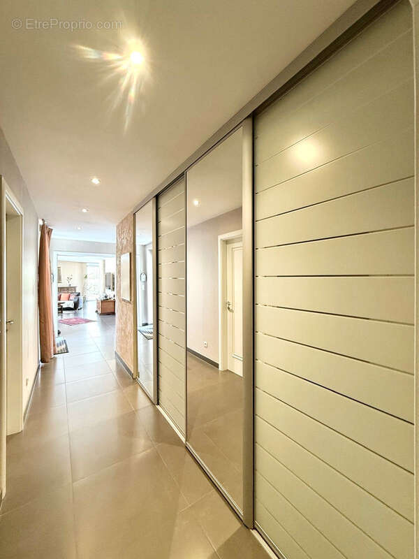 Berstett - L’esprit maison dans une petite copropriété   5 pièces de 141,63 m2 avec jardin, terrasse, garage - photo 4