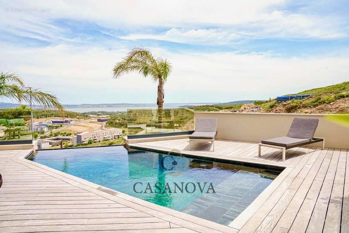 Villa contemporaine surplombant les étangs - photo 4
