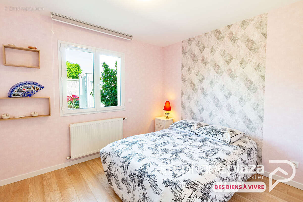 Maison plain-pied de 2018 - 93 m² habitables - 3 chambres - Garage - Terrain de 830m - photo 6