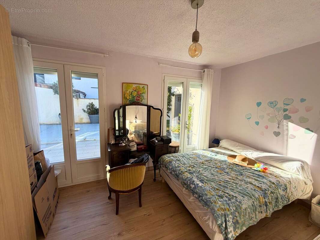 Maison 95 m² à Saint-Esteve  - photo 6