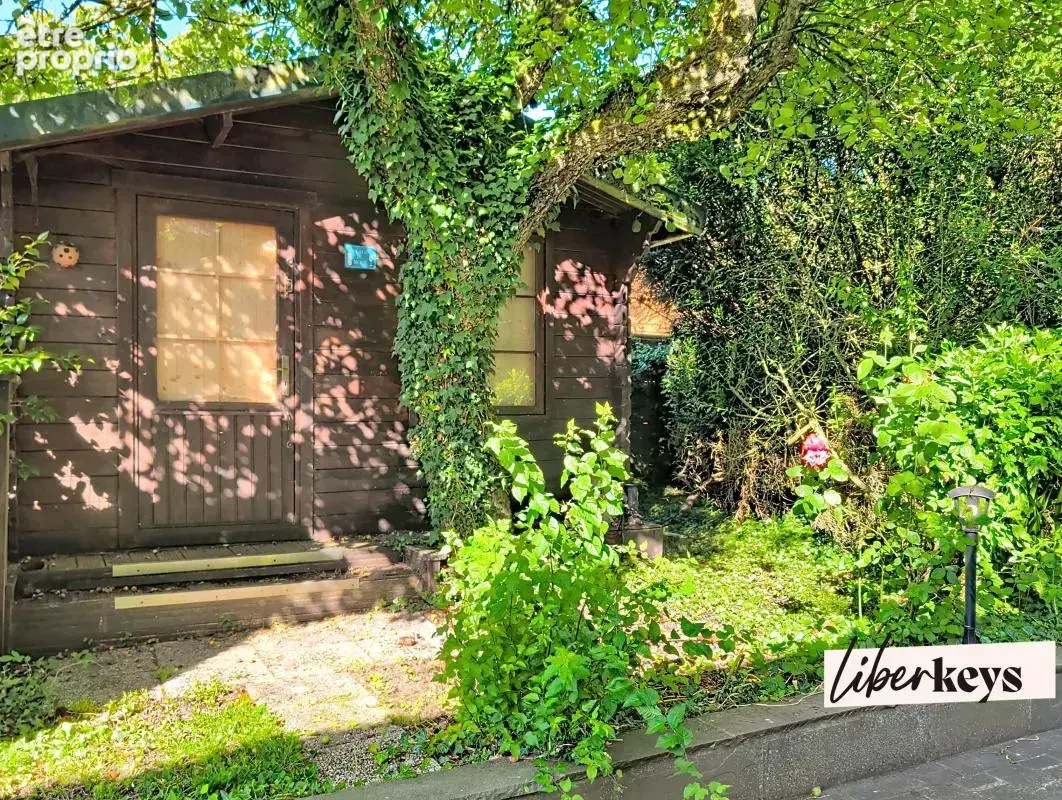 Maison de campagne située à BOURTH, 3 chambres, nombreux garages et remises sur terrain de 1024m2 clos et paysagé - photo 20