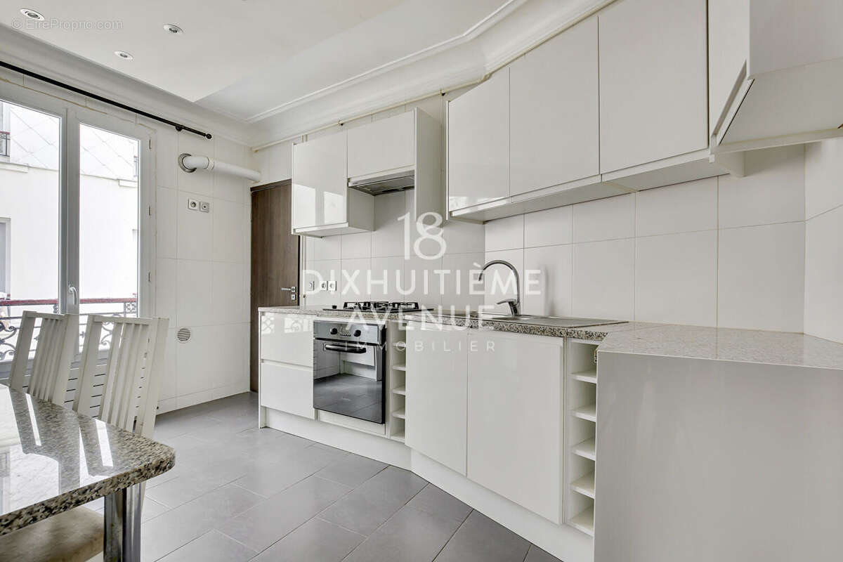 Rue Championnet -43m² - photo 2