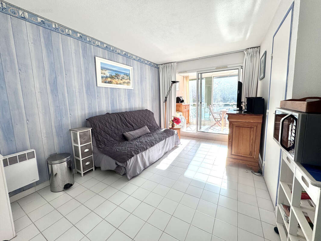 Appartement T2 meublé avec loggia et stationnement privatif - photo 7