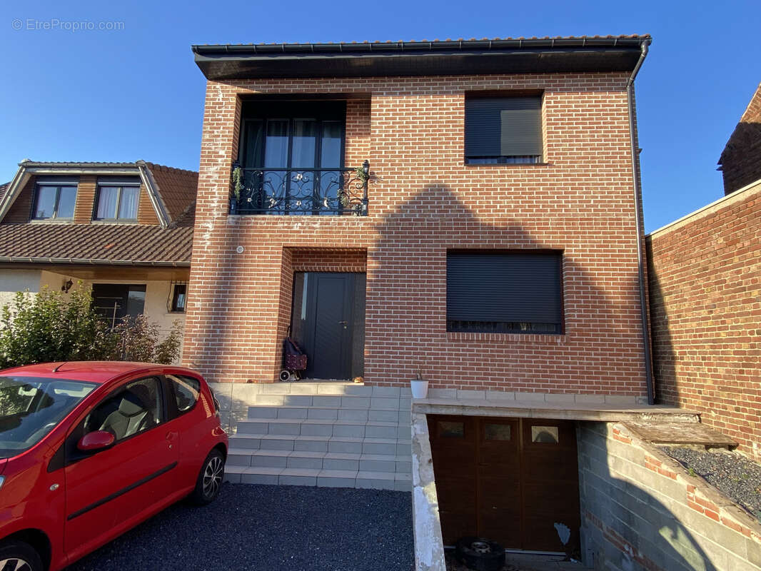 Maison à COURRIERES