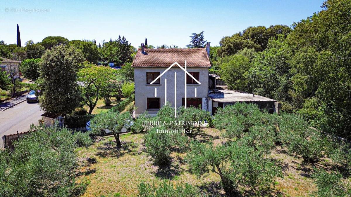 Maison de 1965 avec terrain attenant - photo 1