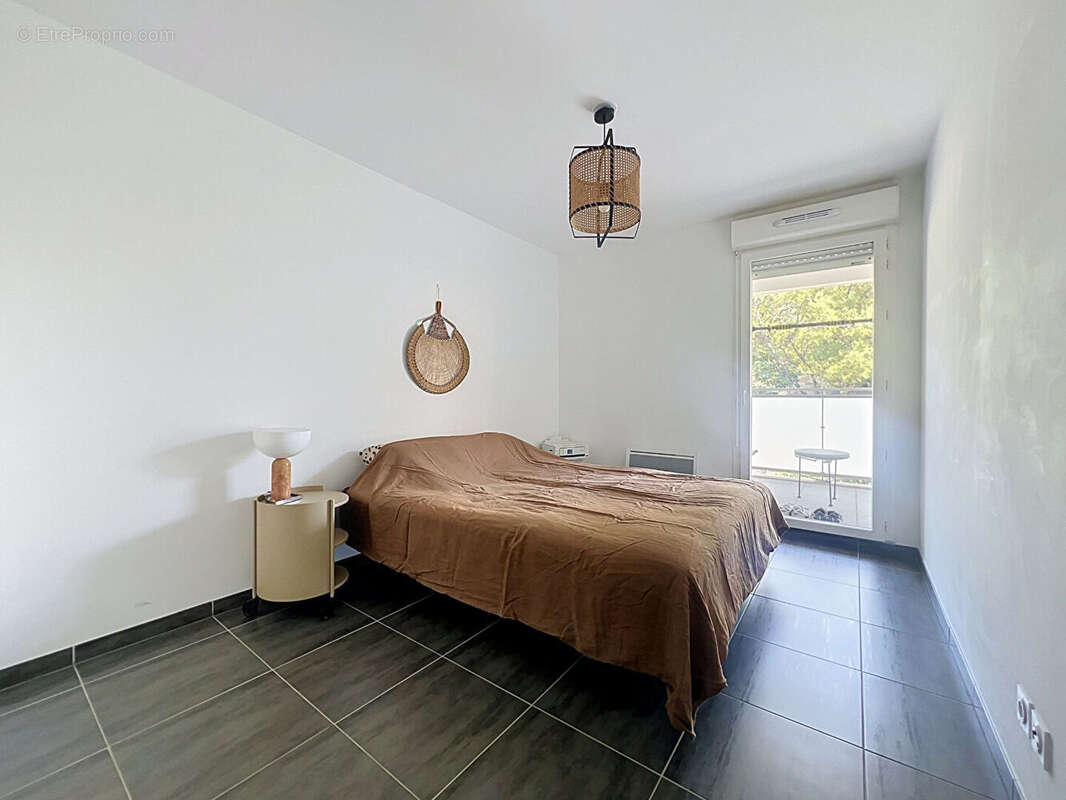 COUP DE COEUR ! Magnifique T3 avec terrasse de 20 m² et garage - Résidence récente -DPE A - photo 10