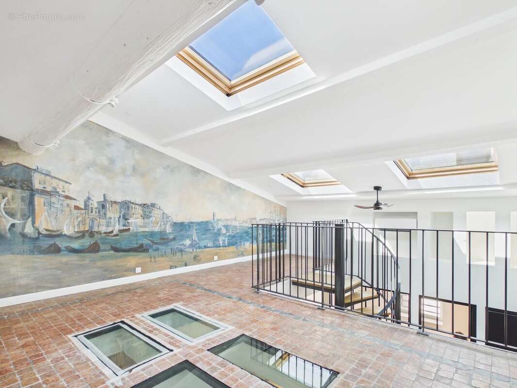 Duplex au charme historique de 102 m² - photo 11