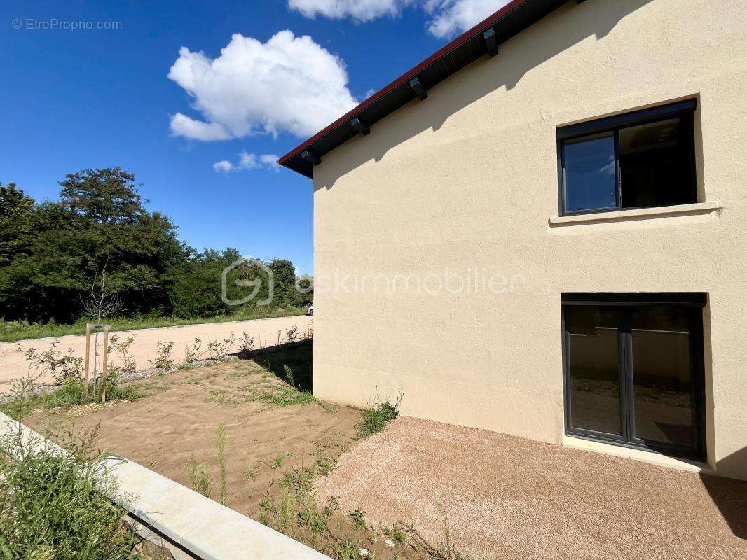 Appartement à SAINT-DIDIER-DE-FORMANS