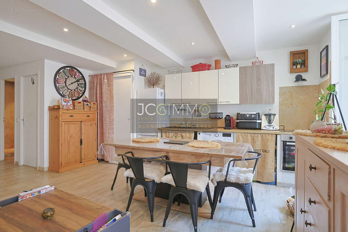 Appartement en rez-de-chaussée 52m2  (T2 + Cave) - photo 2