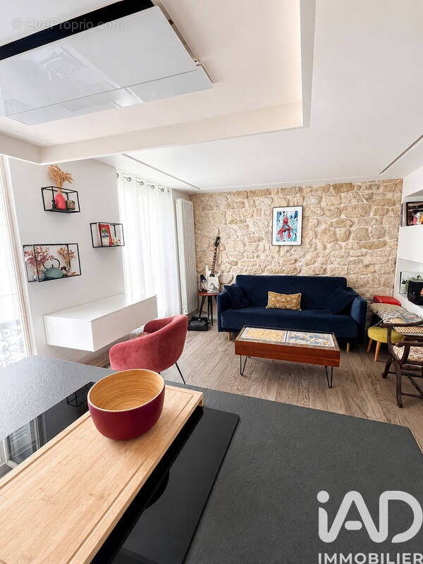 Photo 1 - Appartement à PARIS-18E