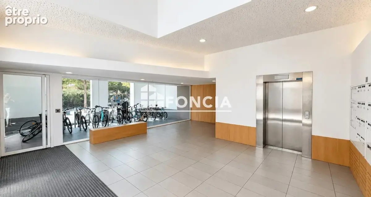 Lyon 2e – confluence  duplex en étages élevés avec loggia, garage et parking - photo 3