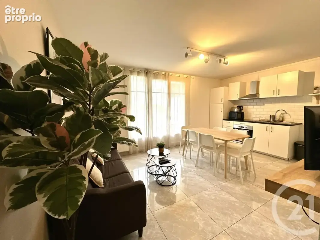 Appartement 4 pièces 65 m² à vendre à Reims (51100) - photo 2