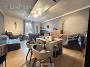 Le salon chaleureux - Appartement à CREPY