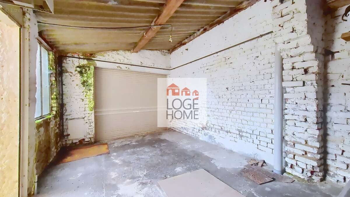 Garage - Maison à DOURGES