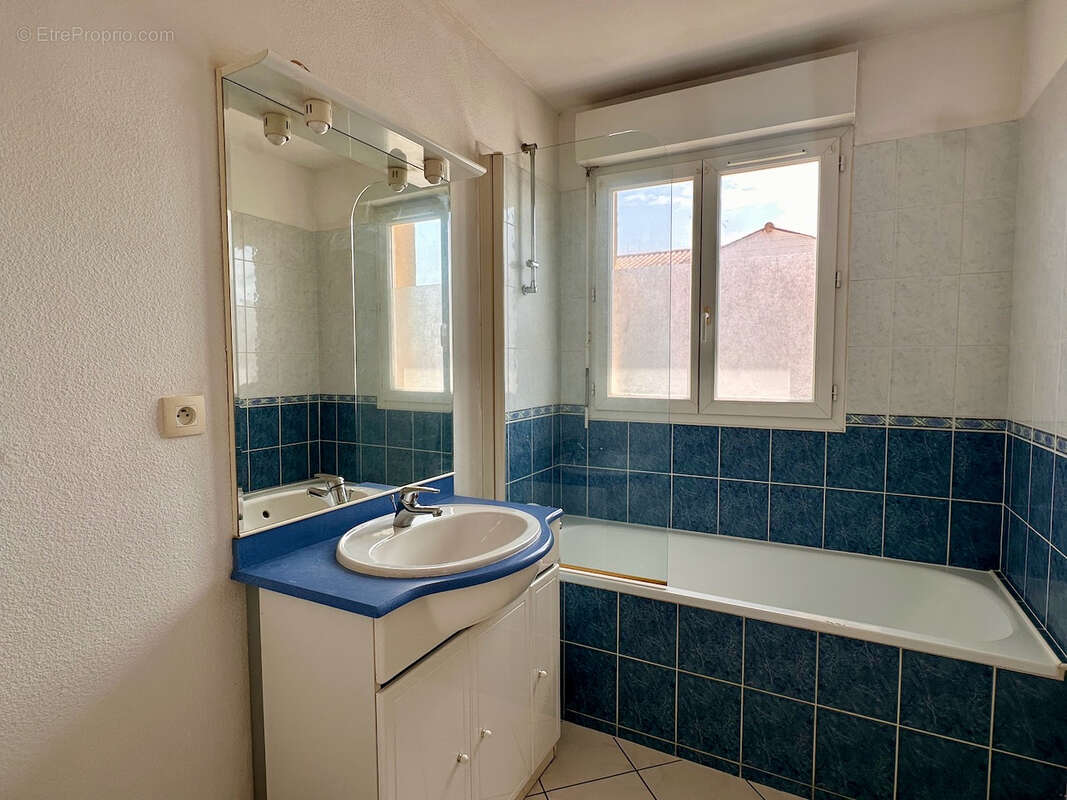 Appartement T2 de 47 m² avec balcon et stationnement Centre-ville - photo 8