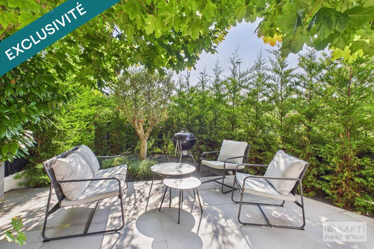 Photo 1 - Maison à COURBEVOIE