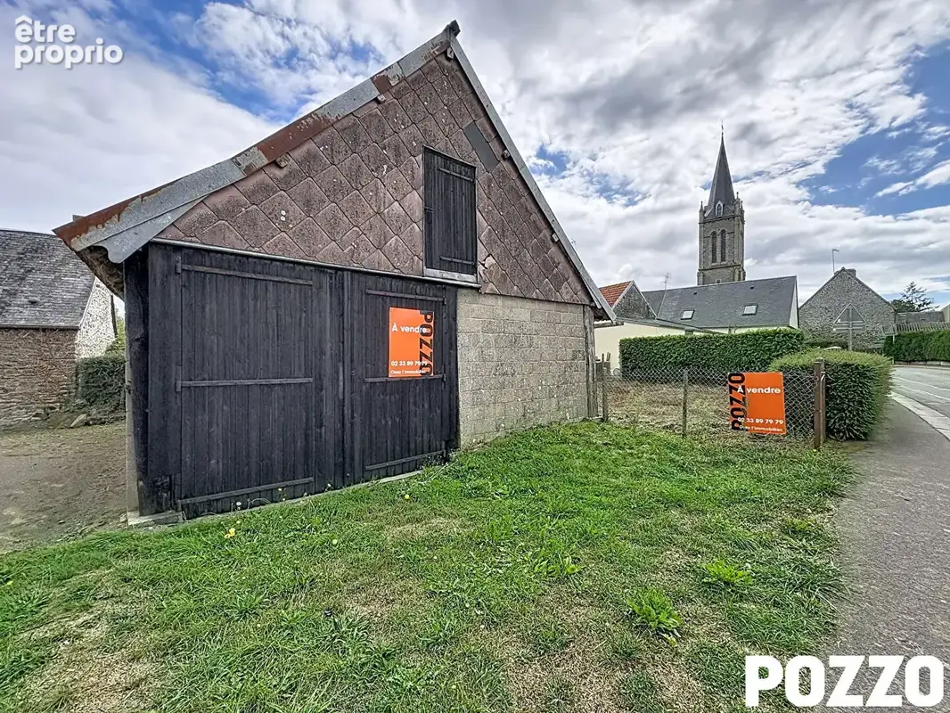 bâtiment à restaurer ou stokage bourg de Vains terrain de 165 m² - photo 2