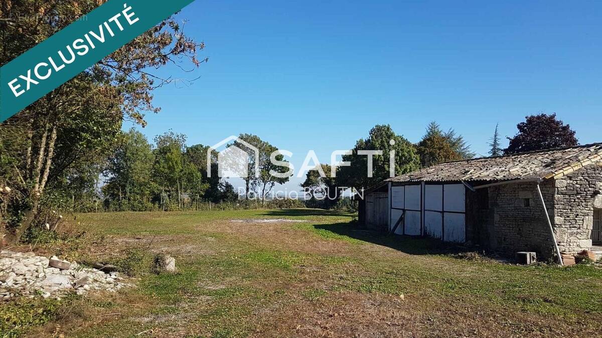 Photo 1 - Terrain à MARIGNY