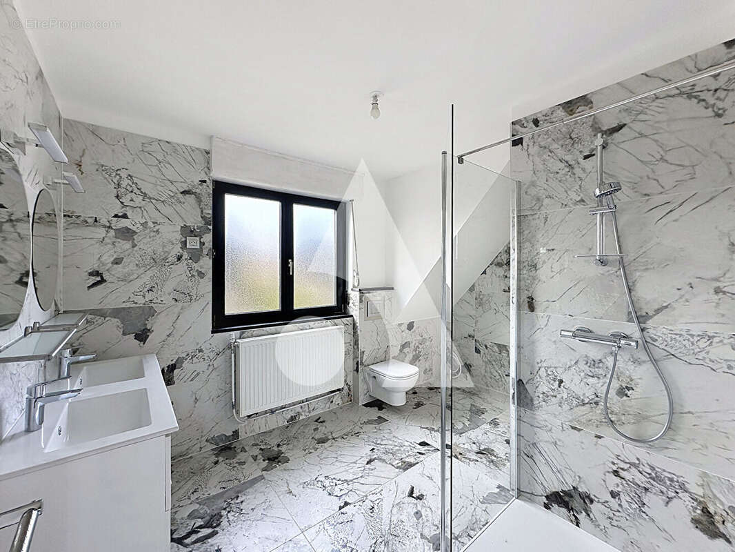 Maison à AULNOY-LEZ-VALENCIENNES