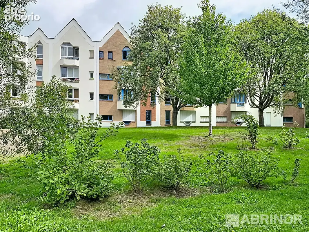 Appartement de 65.85 m² habitables - 2 chambres - SDB - Parking privatif - photo 12