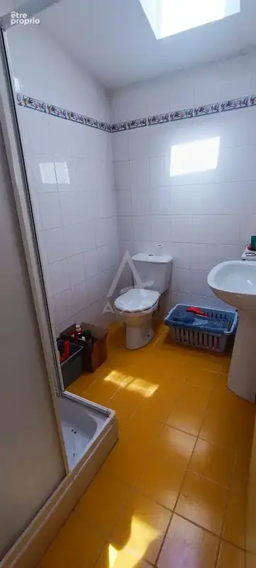 Immeuble loué  Local professionnel + 2 studios - photo 12