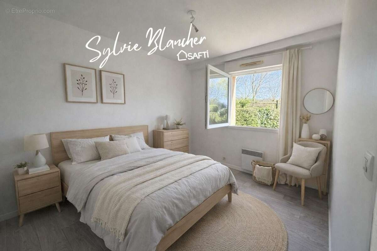 Photo 3 - Appartement à HEROUVILLE-SAINT-CLAIR