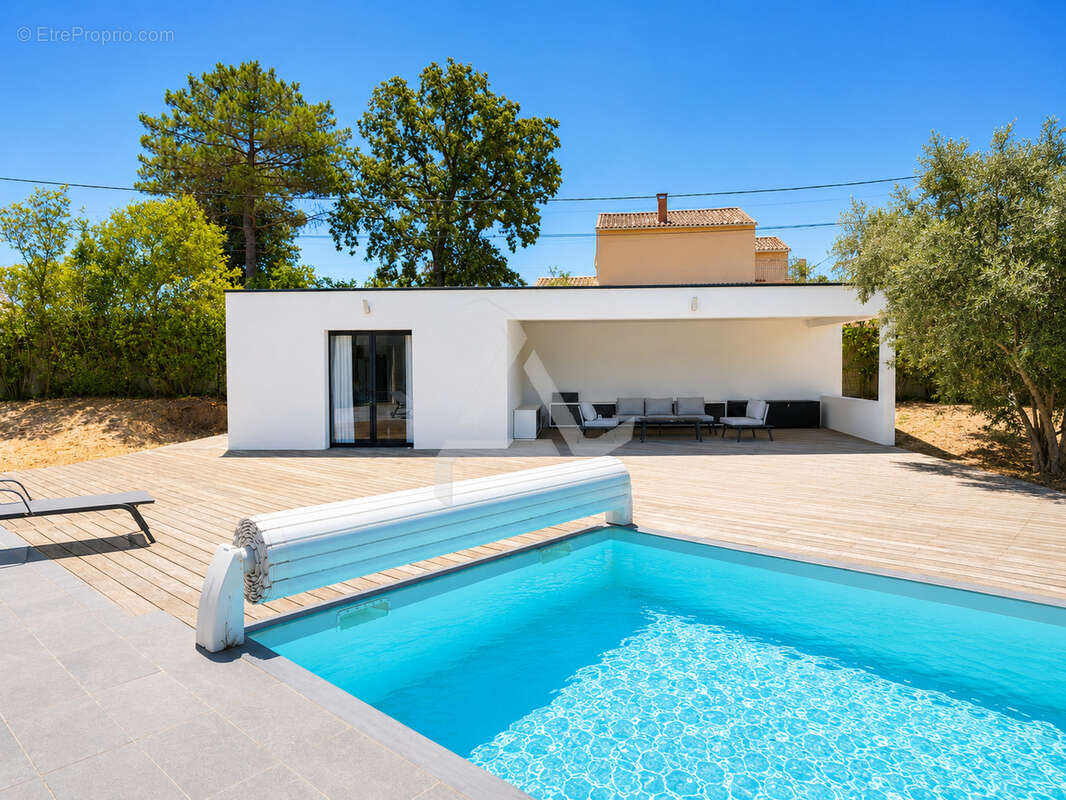 Villa t7 de 211m2 contemporaine avec piscine sous-sol aménagé et chambre indépendante - photo 10