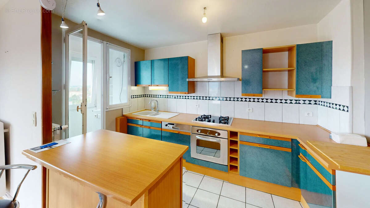 Appartement 4 pièces à vendre au 12ème étage à Besançon - Réf. 5982 - photo 5
