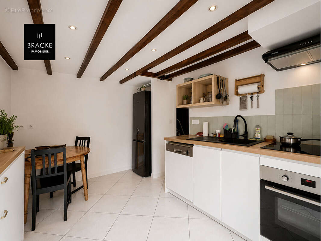 Asnières-sur-Seine -Maison de ville rénovée avec 3 chambres, patio et terrasse arborée - photo 9
