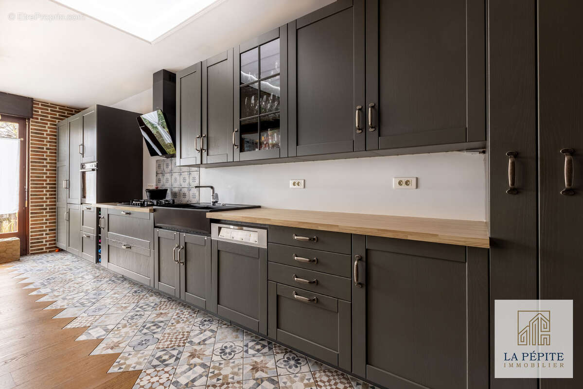 Maison à QUIEVRECHAIN