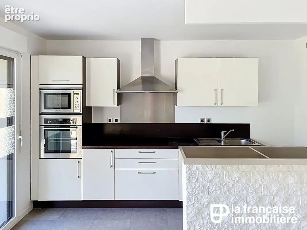 Vente appartement T4 - 78.8 m² L'HERMITAGE - 3 chambres, balcon, garage - photo 3
