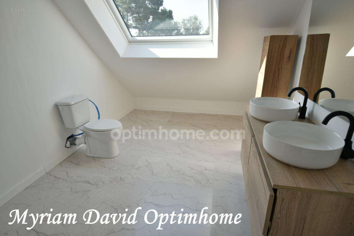 Maison familiale 171 m² – DPE C – 5 chambres – Terrain paysagé de 2 400 m² – Rostrenen - photo 13