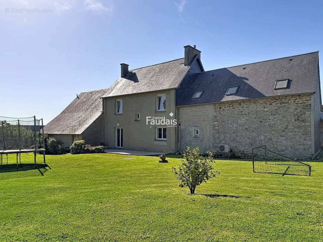 Maison à CAVIGNY