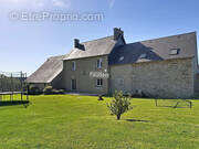 Maison à CAVIGNY