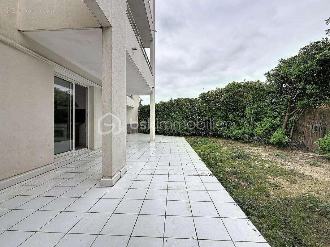 Appartement 2 pièces de 59 m2 avec jardin de 130 m2 + parking et cave - photo 4