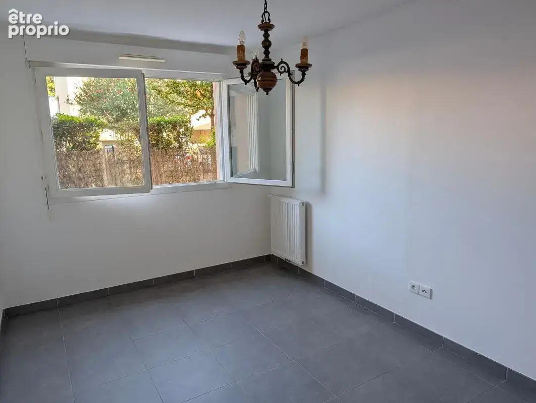 Appartement T3 RDJ avec parking centre ville au calme - photo 2
