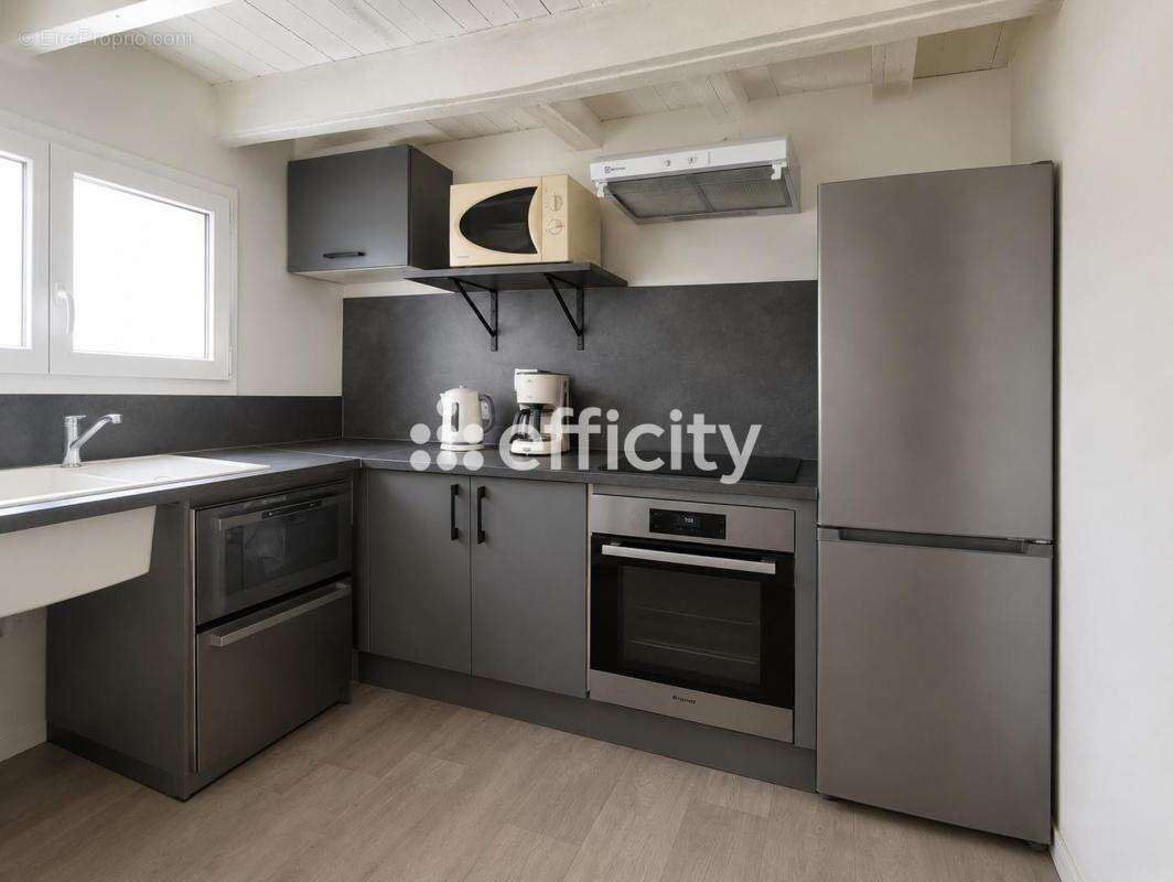 Maison 64 m² à Saintes  - photo 4