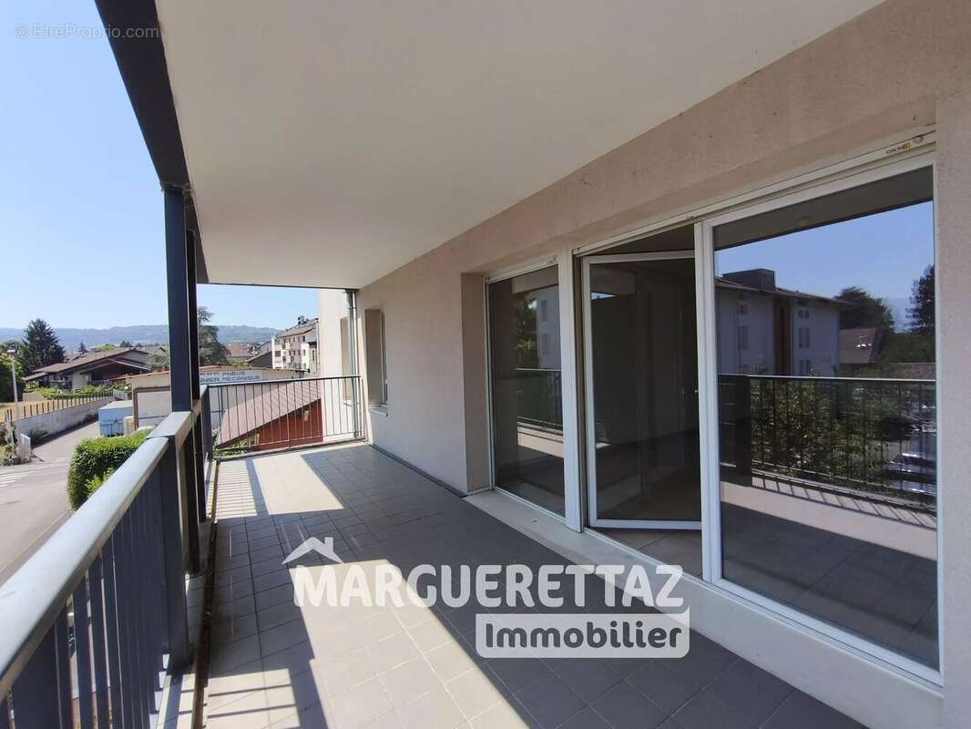 Au coeur de Reignier, T3 avec terrasse au calme + 2 places de parc en sous-sol et cave - photo 12