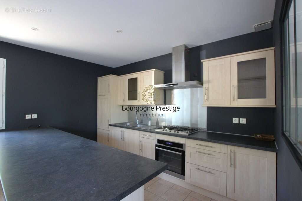 A l'ouest de tournus jolie maison de 89 m² sur sous-sol  - terrain de 1394 m² - photo 4