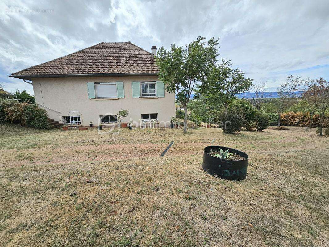 Maison à COMMELLE-VERNAY