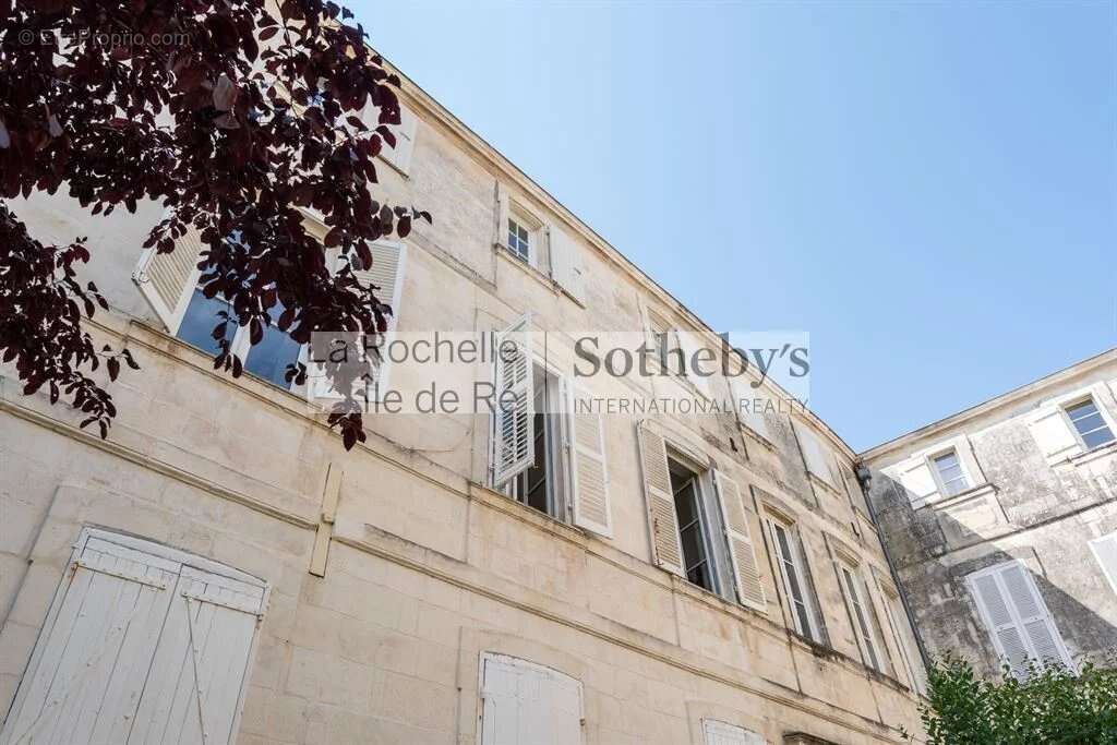 Un vrai citadin proche du port et de ses rues commerçantes, à la - photo 17