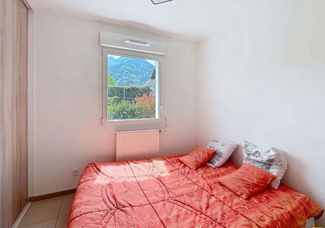 DOUSSARD - Appartement T4 lumineux avec jardin - photo 8