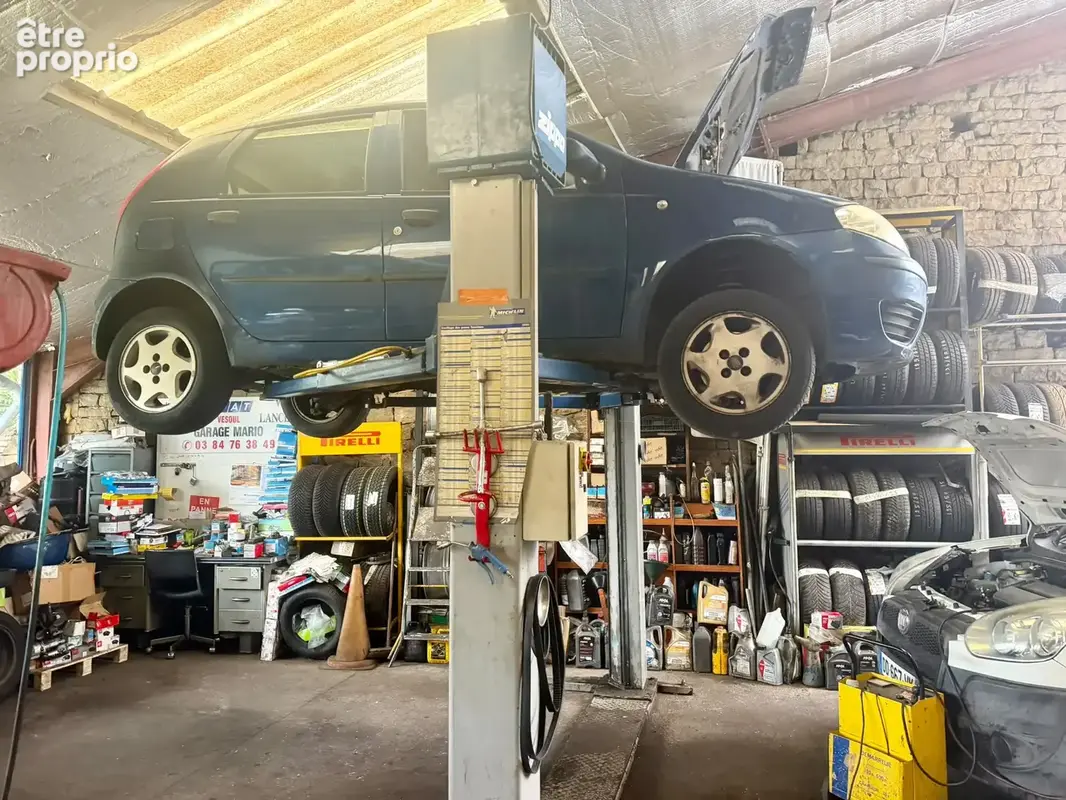 Vente immeuble avec garage automobile et appartement T6 VESOUL - photo 12