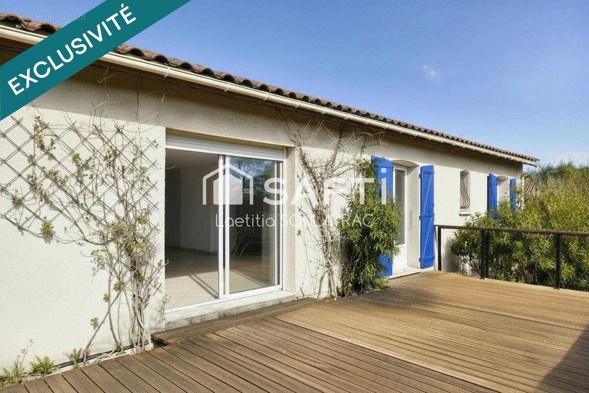 Photo 1 - Maison à LABRUGUIERE