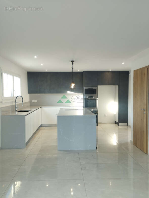 Maison individuelle construite en 2022 d'environ 90m2 sur un terrain de 3,92 ares proche de la frontière Suisse - photo 3