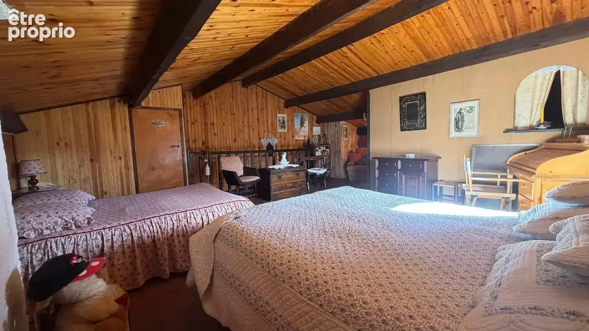 Chalet en bois avec terrasse plein sud et grand terrain arboré de 2 680 m² - photo 11